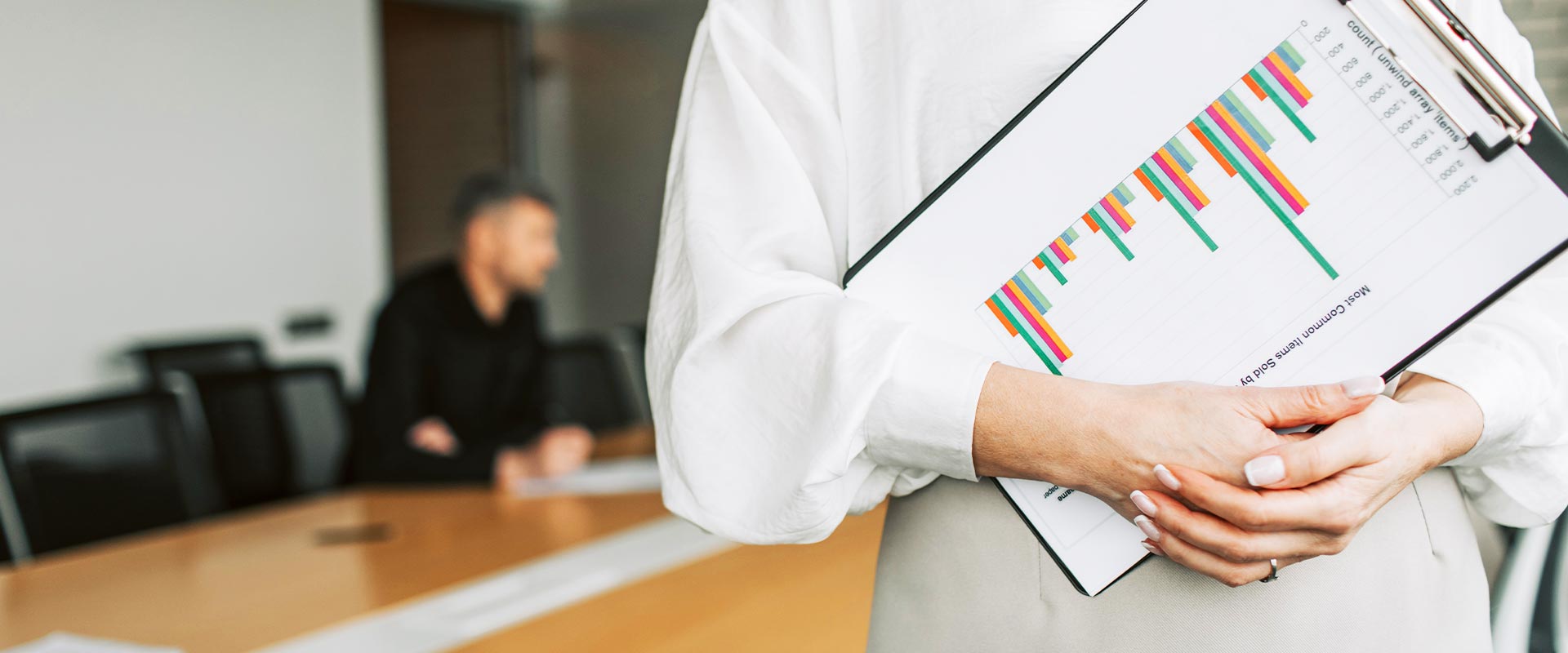 Woman holding Clipboard with Chart